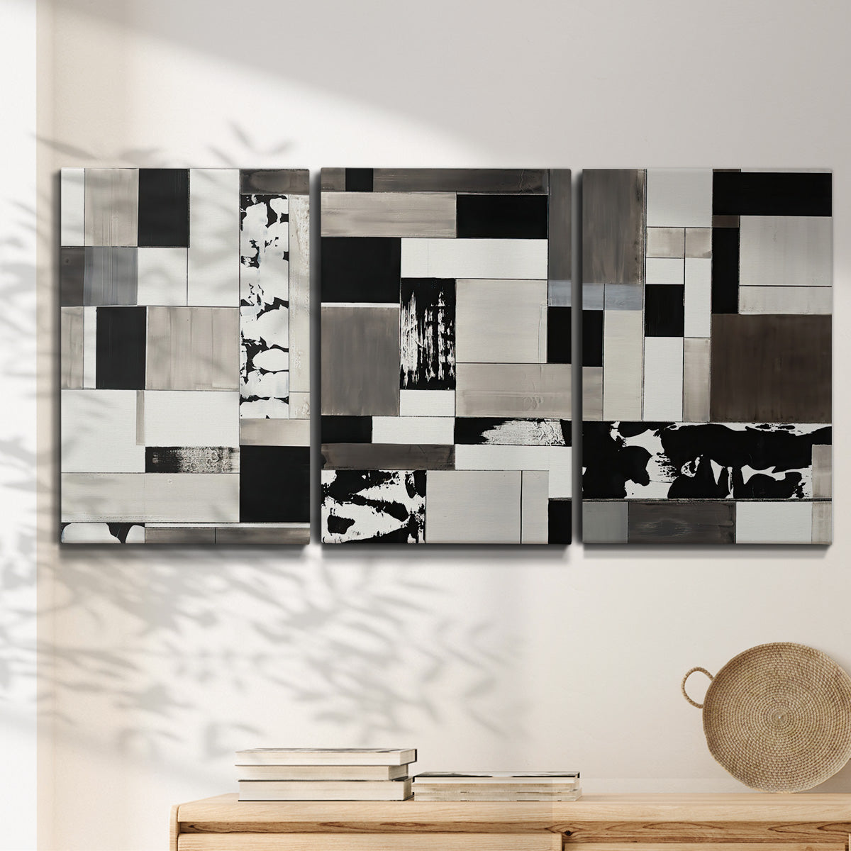 Three-panel canvas wall art featuring rectangular mid century geometric abstraction, displayed in a minimalist living room above a console table.