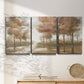 Three-panel canvas wall art featuring soft pastel park landscape scene, displayed in a minimalist living room above a console table.