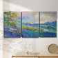 Three-panel canvas wall art featuring cheerful landscape under open sky, displayed in a minimalist living room above a console table.