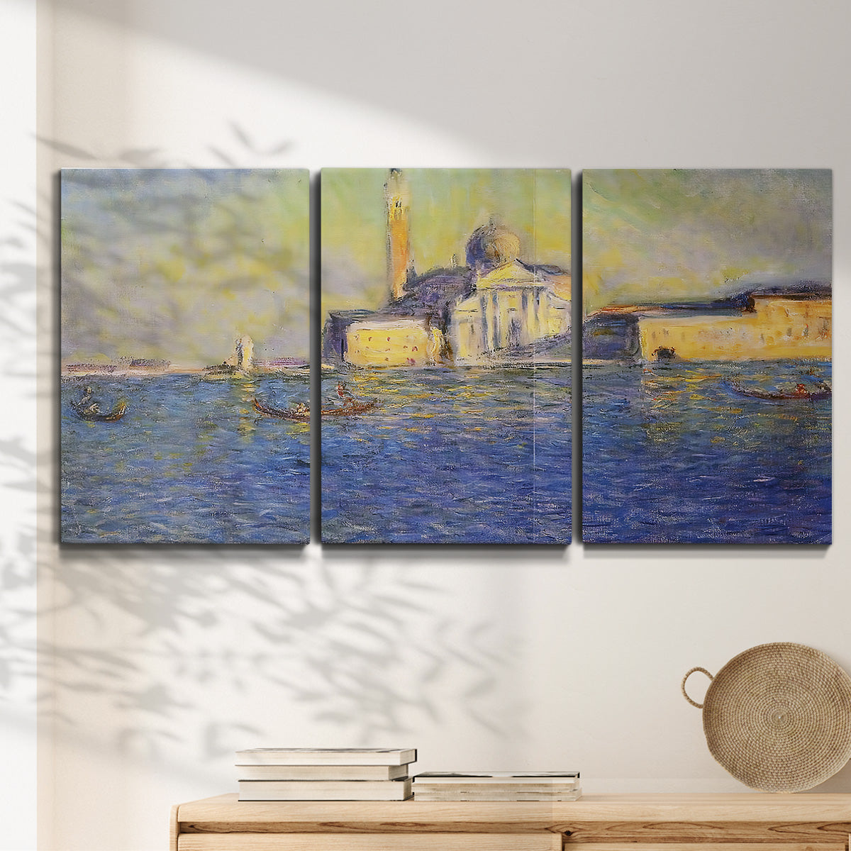 Three-panel canvas wall art featuring layered modern abstract color ribbons, displayed in a minimalist living room above a console table.