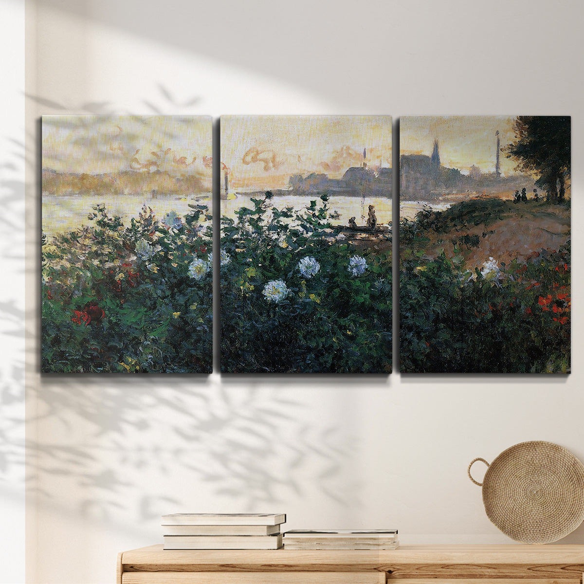 Three-panel canvas wall art featuring formal garden near museum grounds, displayed in a minimalist living room above a console table.