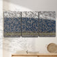 Three-panel canvas wall art featuring group of animals in open field, displayed in a minimalist living room above a console table.