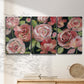 Three-panel canvas wall art featuring bold red floral abstraction, displayed in a minimalist living room above a console table.
