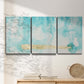 Three-panel canvas wall art featuring saturated abstract color fields, displayed in a minimalist living room above a console table.