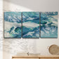 Three-panel canvas wall art featuring layered abstract marble textures, displayed in a minimalist living room above a console table.