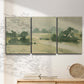 Three-panel canvas wall art featuring pasture landscape in soft watercolor, displayed in a minimalist living room above a console table.
