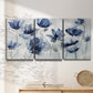 Three-panel canvas wall art featuring indigo floral blossoms awakening, displayed in a minimalist living room above a console table.