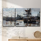 Three-panel canvas wall art featuring harbor scene with boats and quays, displayed in a minimalist living room above a console table.