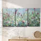 Three-panel canvas wall art featuring night landscape silhouette photography, displayed in a minimalist living room above a console table.