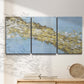 Three-panel canvas wall art featuring , displayed in a minimalist living room above a console table.