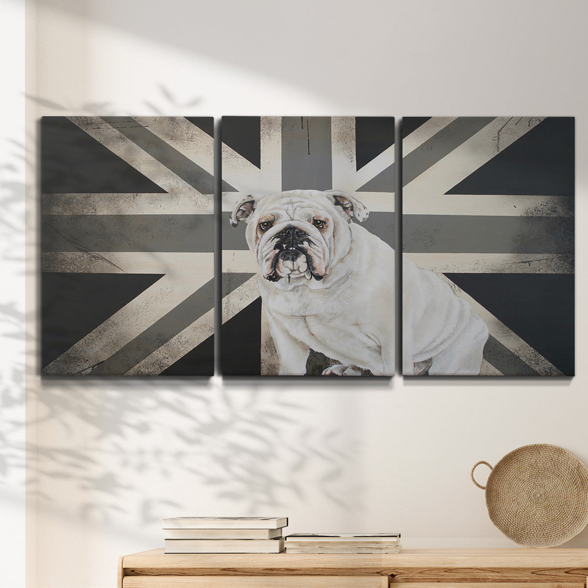 Three-panel canvas wall art featuring black and white animal collage, displayed in a minimalist living room above a console table.