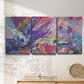 Three-panel canvas wall art featuring expressive abstract with layered color, displayed in a minimalist living room above a console table.