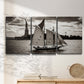 Three-panel canvas wall art featuring historic sailing ships photograph, displayed in a minimalist living room above a console table.