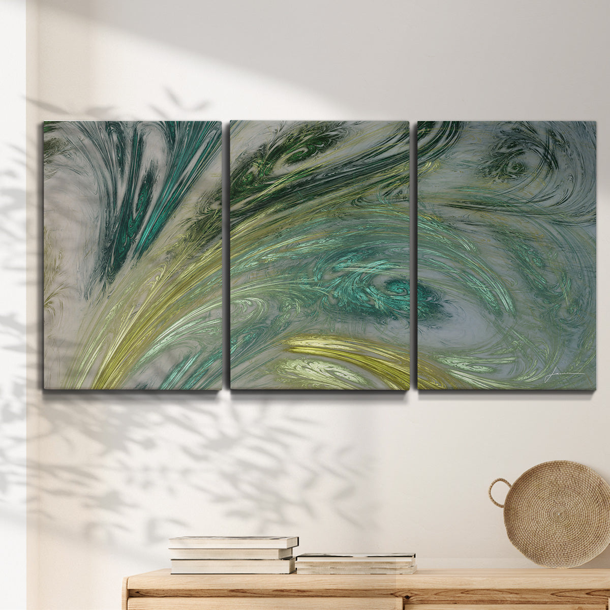 Three-panel canvas wall art featuring layered modern abstract landscape, displayed in a minimalist living room above a console table.