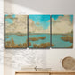 Three-panel canvas wall art featuring abstract pond scene with reflections, displayed in a minimalist living room above a console table.