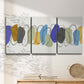 Three-panel canvas wall art featuring minimalist geometric abstract spacing, displayed in a minimalist living room above a console table.
