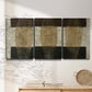 Three-panel canvas wall art featuring textured abstract vessel forms, displayed in a minimalist living room above a console table.