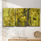 Three-panel canvas wall art featuring backlit aspen trees photograph, displayed in a minimalist living room above a console table.