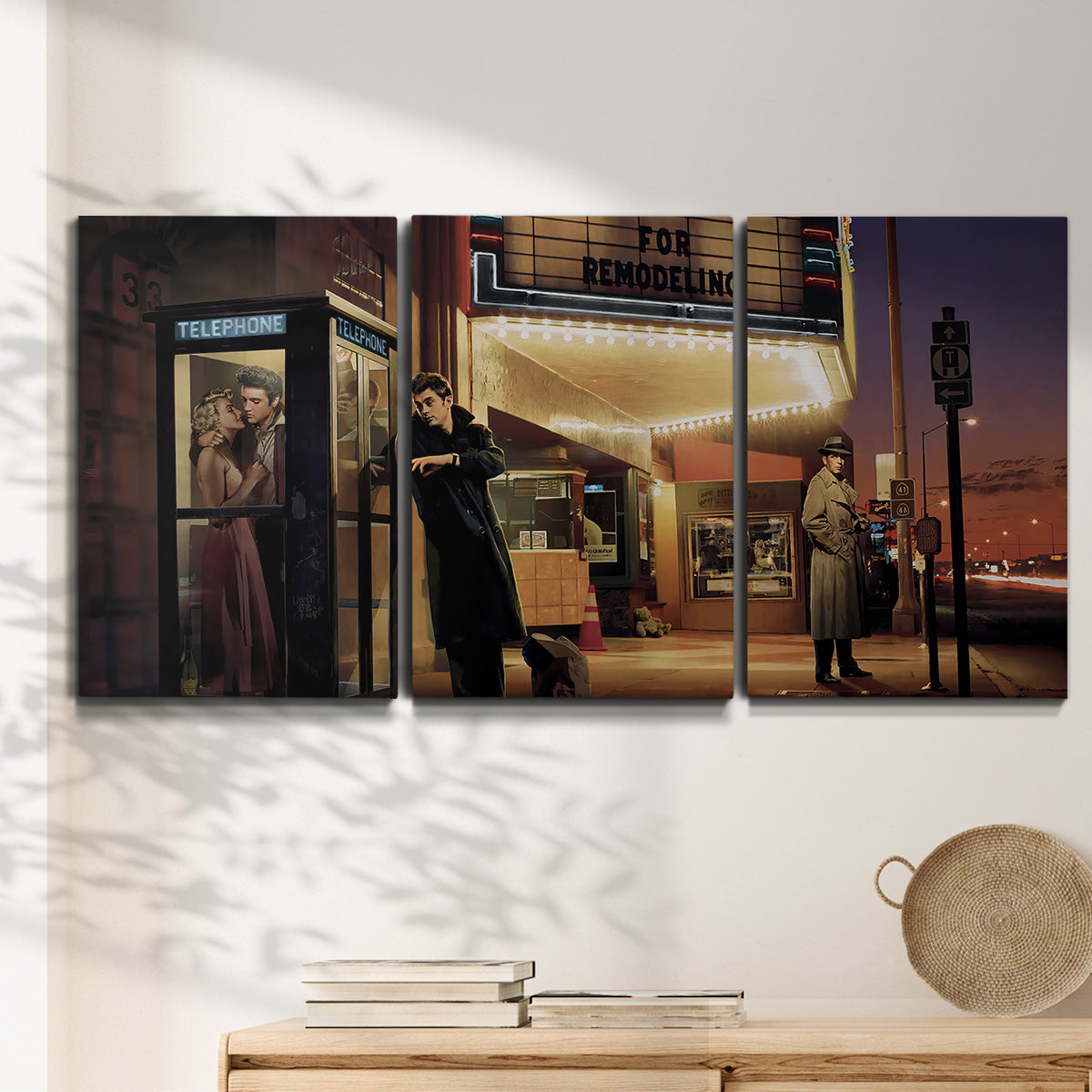 Three-panel canvas wall art featuring cinematic nighttime theater scene, displayed in a minimalist living room above a console table.