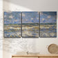 Three-panel canvas wall art featuring rough sea with crashing waves, displayed in a minimalist living room above a console table.