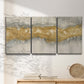 Three-panel canvas wall art featuring flowing abstract golden tones, displayed in a minimalist living room above a console table.