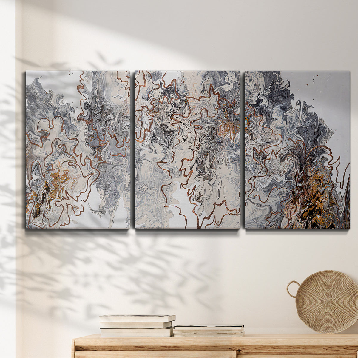 Three-panel canvas wall art featuring wooded trail through forest, displayed in a minimalist living room above a console table.
