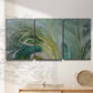 Three-panel canvas wall art featuring layered modern abstract landscape, displayed in a minimalist living room above a console table.