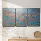 Three-panel canvas wall art featuring sunlit valley landscape, displayed in a minimalist living room above a console table.