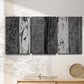 Three-panel canvas wall art featuring brushed metallic abstract textures, displayed in a minimalist living room above a console table.