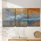 Three-panel canvas wall art featuring bridge shrouded in fog and smoke, displayed in a minimalist living room above a console table.