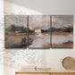 Three-panel canvas wall art featuring quiet pond with soft reflections, displayed in a minimalist living room above a console table.