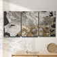 Three-panel canvas wall art featuring pale abstract mask like forms, displayed in a minimalist living room above a console table.