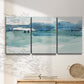 Three-panel canvas wall art featuring minimalist ultramarine abstract vista, displayed in a minimalist living room above a console table.