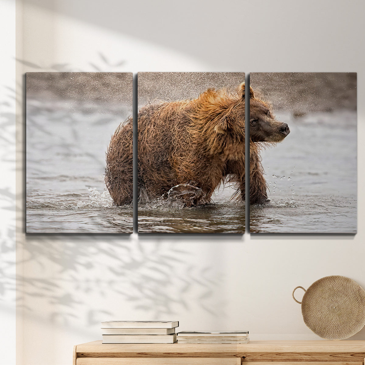 Three-panel canvas wall art featuring wildlife photography animal portrait, displayed in a minimalist living room above a console table.