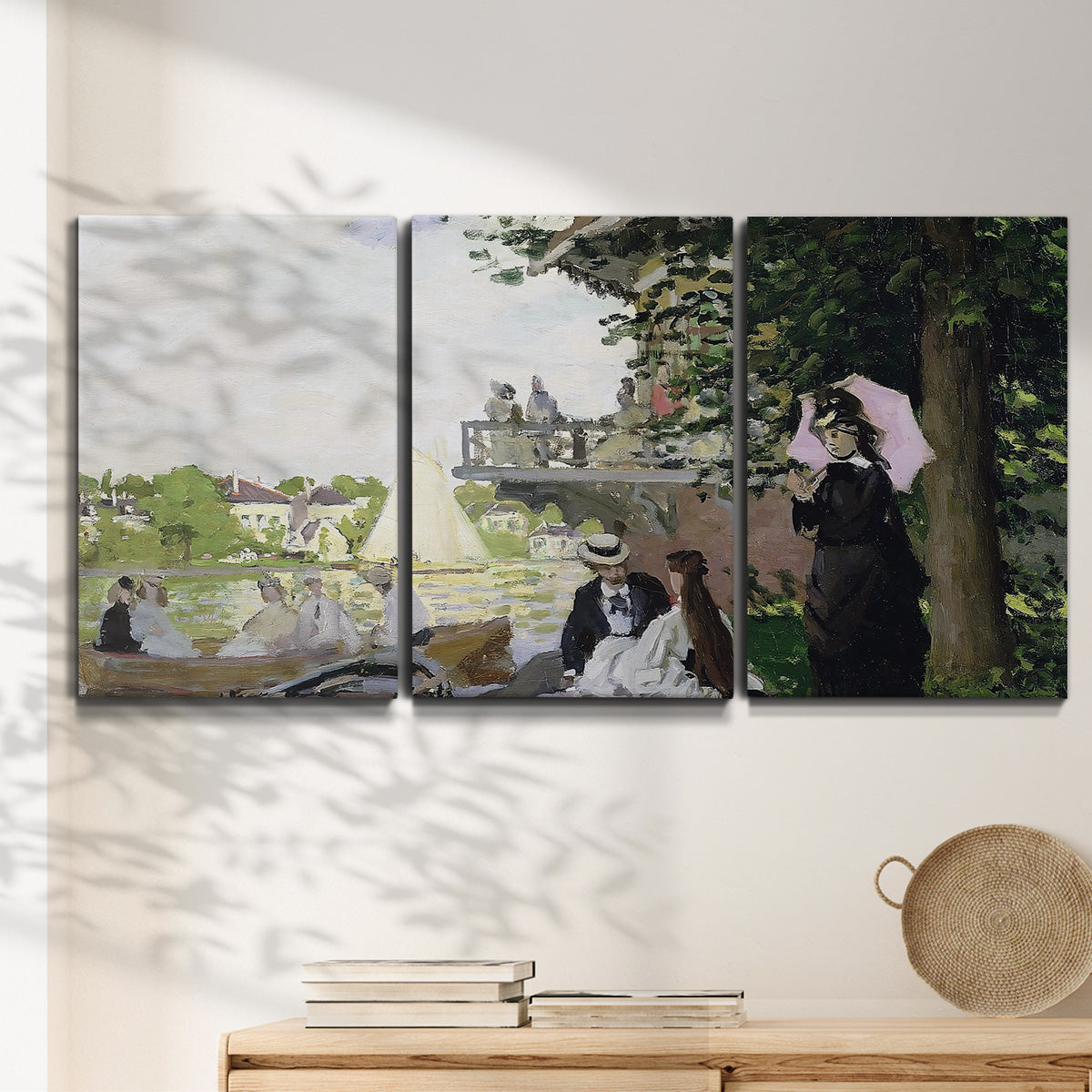 Three-panel canvas wall art featuring garden house beside river, displayed in a minimalist living room above a console table.