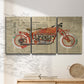 Three-panel canvas wall art featuring vintage red vehicle collage detail, displayed in a minimalist living room above a console table.