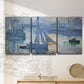 Three-panel canvas wall art featuring sailboats racing on river, displayed in a minimalist living room above a console table.