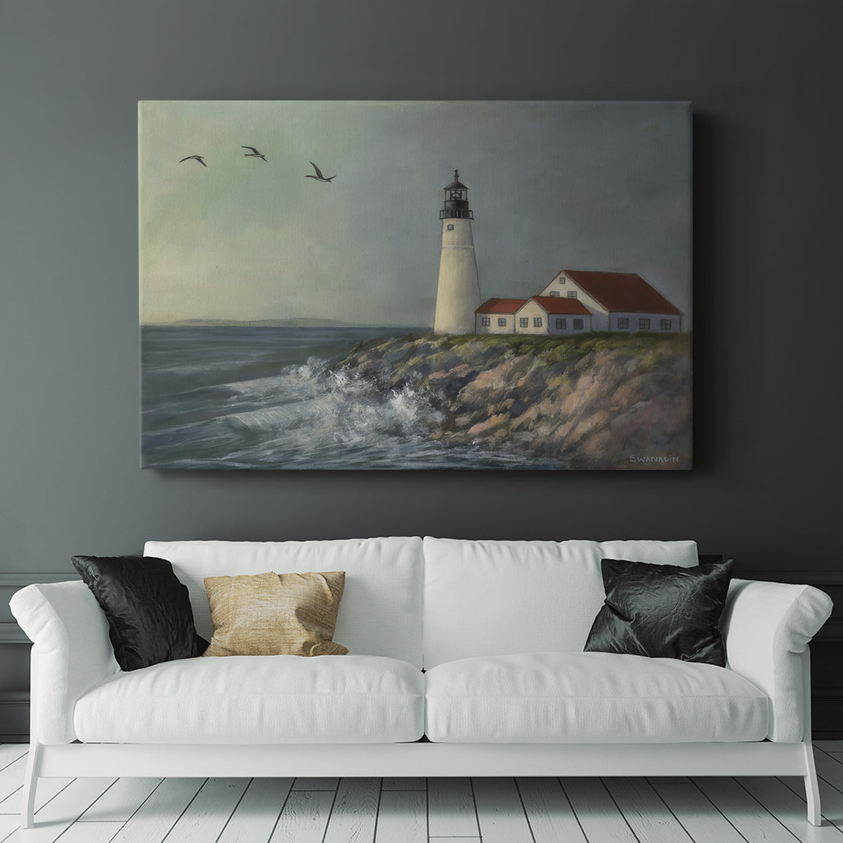 Lighthouse stands tall against crashing waves at a coastal location with birds flying overhead during a calm day