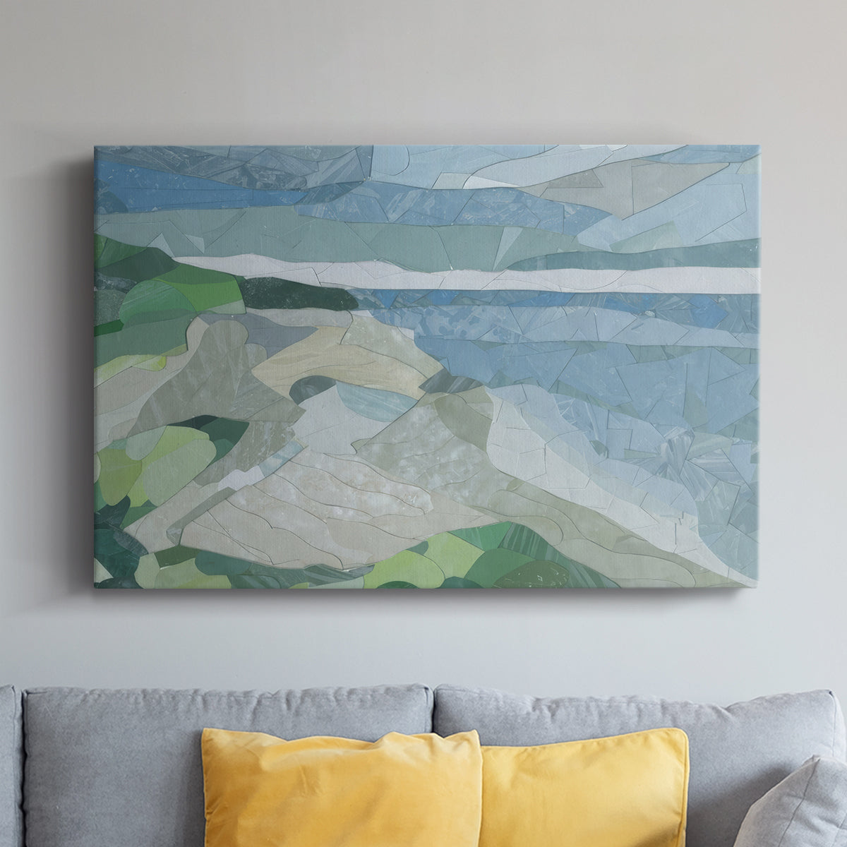 Colorful geometric landscape artwork depicting a coastal view with blue waters and green hills during daytime