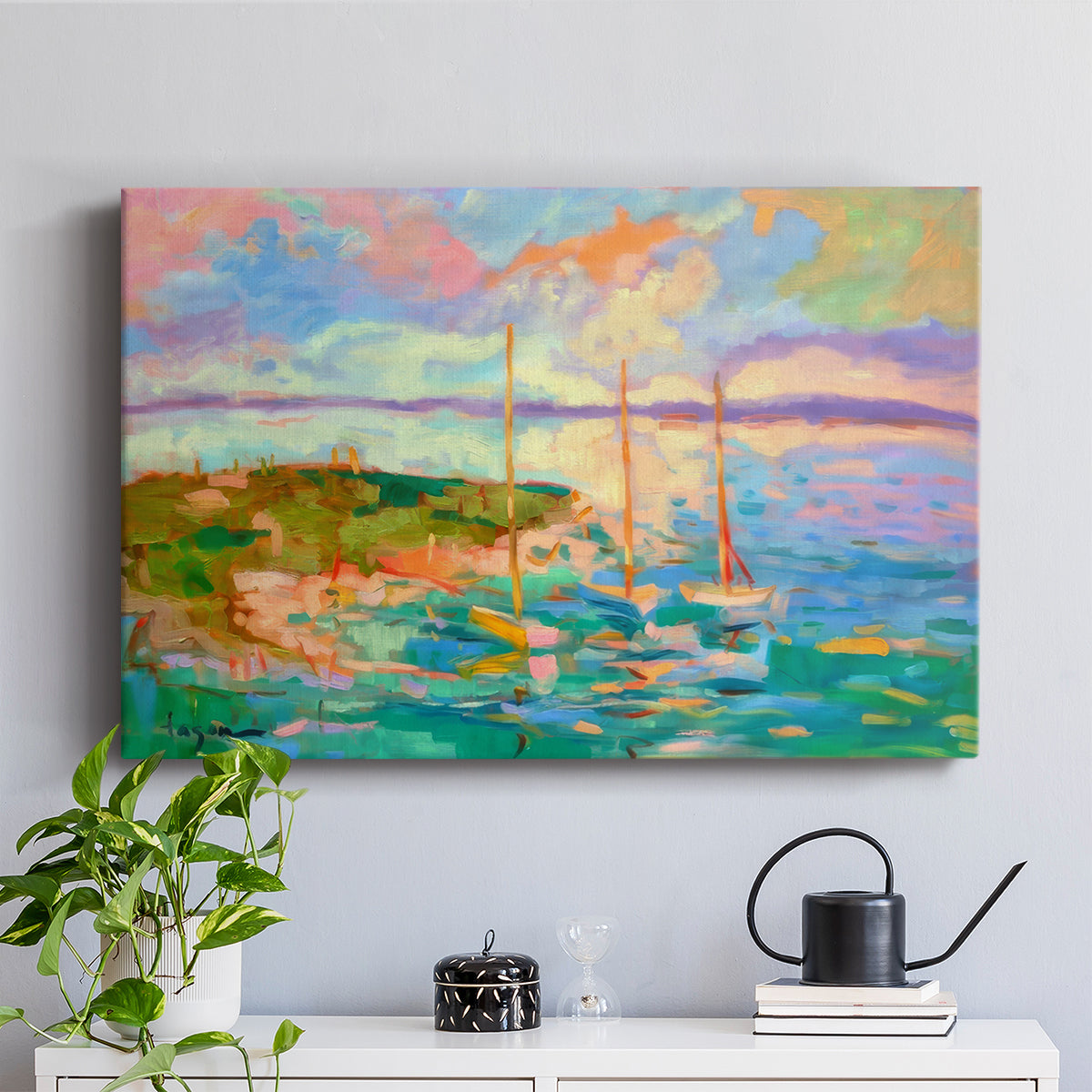 Colorful seascape with boats and vibrant skies over a coastal landscape in late afternoon light