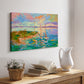 Colorful seascape with boats and vibrant skies over a coastal landscape in late afternoon light