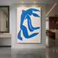 Canvas art print of an abstract composition of a female figure with flowing hair in bold shapes displayed as a statement piece in a spacious interior.