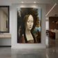 Canvas art print of a Renaissance portrait of a young woman with soft features and dark background displayed as a statement piece in a spacious interior.