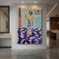 Canvas art print of a fauvist still life of yellow flowers against a bold blue and pink patterned background displayed as a statement piece in a spacious interior.
