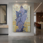 Canvas art print of an expressionist floral composition with bold shapes and patterned backdrop displayed as a statement piece in a spacious interior.