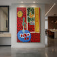 Canvas art print of a fauvist interior still life with a blue table against a bold red patterned room displayed as a statement piece in a spacious interior.