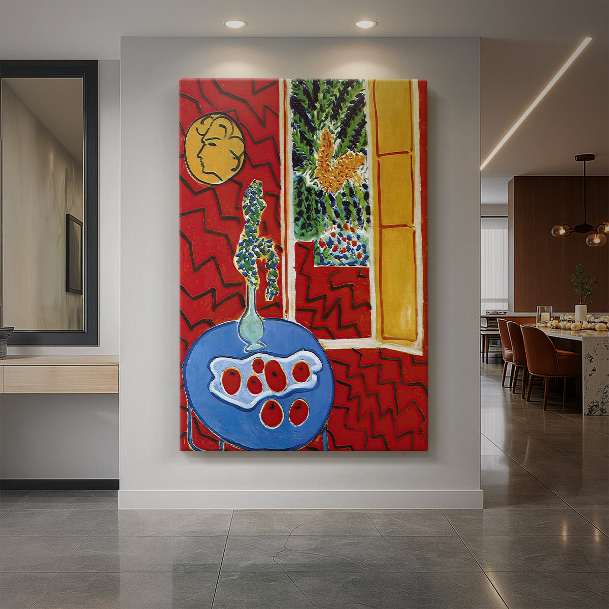 Canvas art print of a fauvist interior still life with a blue table against a bold red patterned room displayed as a statement piece in a spacious interior.