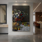 Canvas art print of an impressionist still life of flowers and fruit arranged in a soft natural setting displayed as a statement piece in a spacious interior.