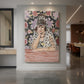 Canvas art print of a fauvist portrait of a woman with Spanish styling and bold color displayed as a statement piece in a spacious interior.