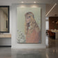 Canvas art print of a Romantic portrait of a young woman with delicate features and soft tones displayed as a statement piece in a spacious interior.